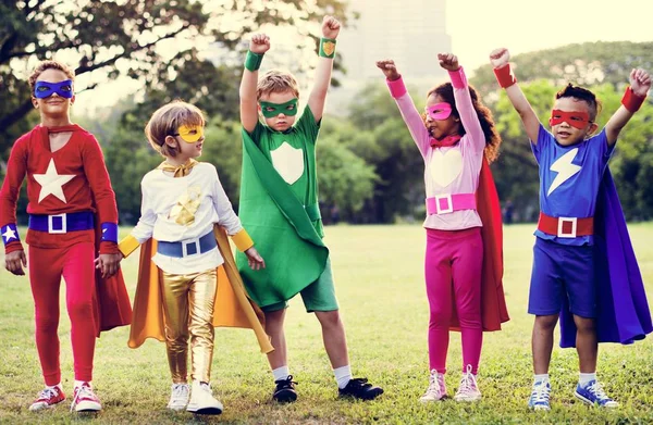 depositphotos_160112544-stock-photo-adorable-children-in-superhero-costumes